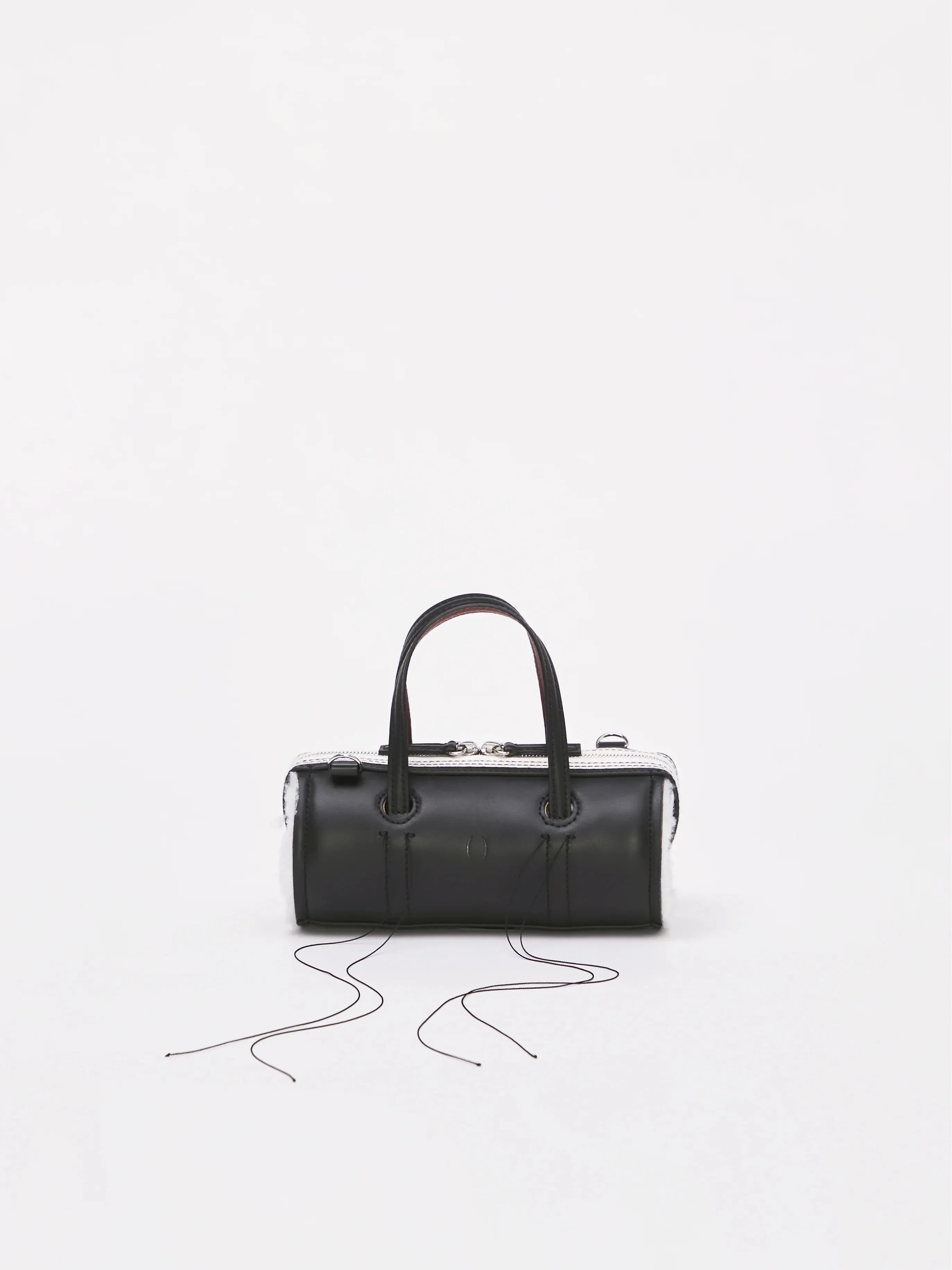 Anona Cylinder Bag in Black by Dentro